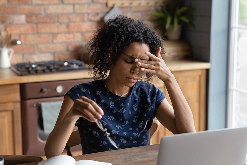 Young woman with migraine