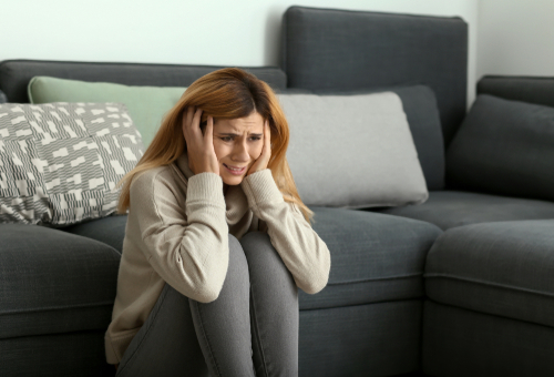 girl panicking in bedroom 