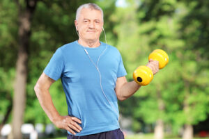 older man lifting weights 
