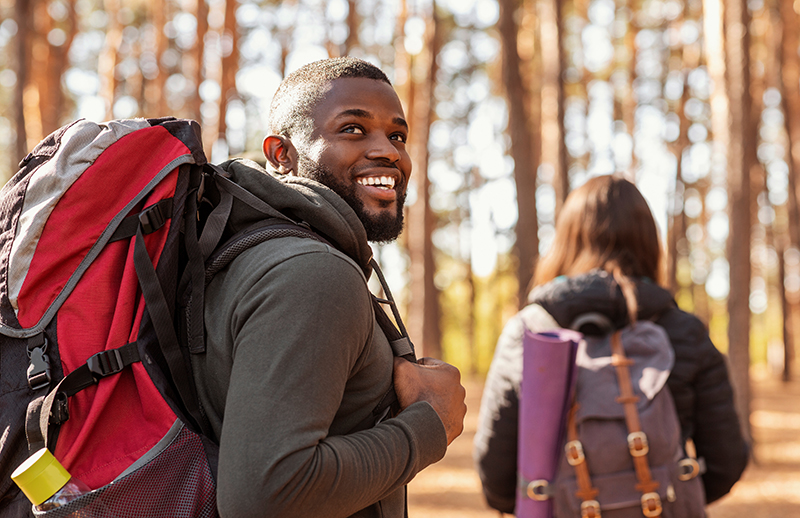 Happy man hiking